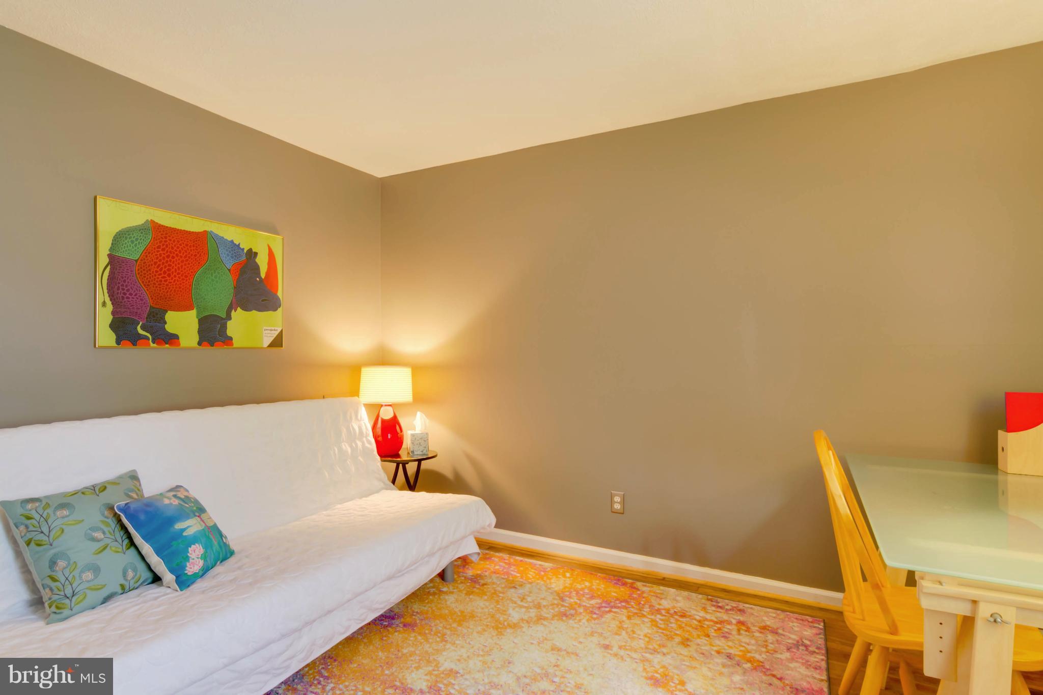 8317 Kingsgate Road, Unit 517 Springfield, VA 22152 - Photo 16 of 30 a living room with furniture and couch