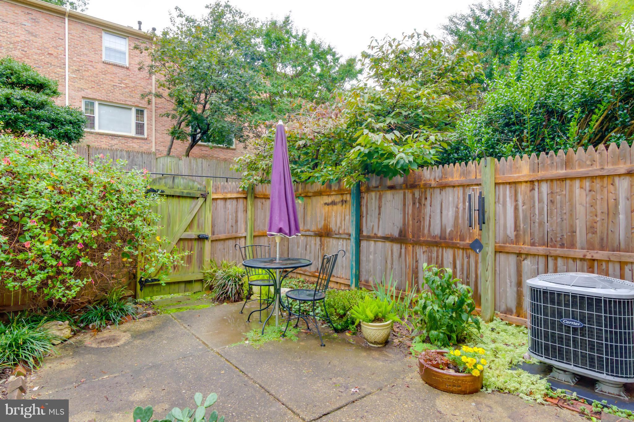 8317 Kingsgate Road, Unit 517 Springfield, VA 22152 - Photo 23 of 30 a garden view with a seating space