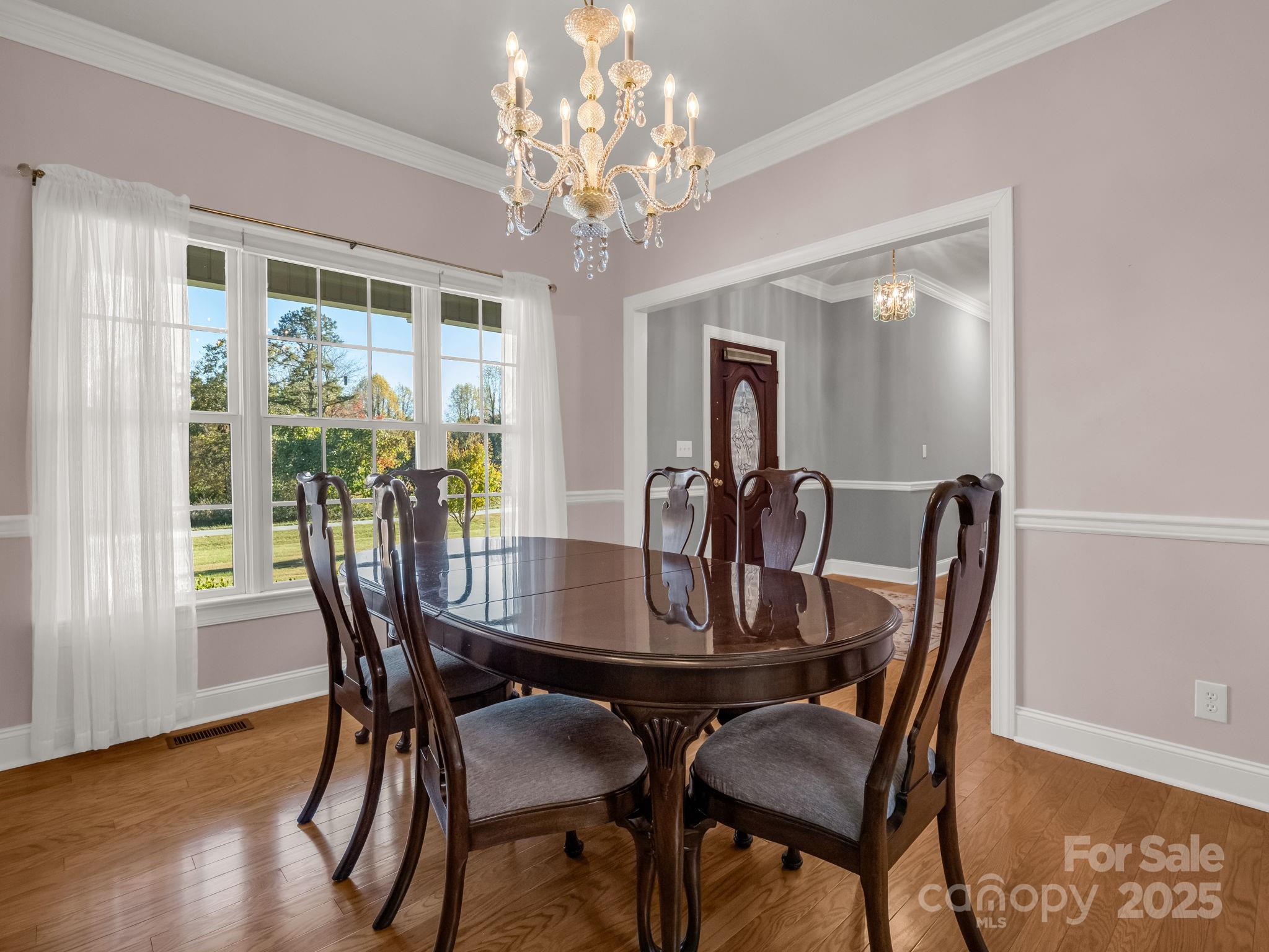 757 Smith Grove Road Forest City, NC 28043 - Photo 16 of 46 a view of a dining room with furniture window and wooden floor