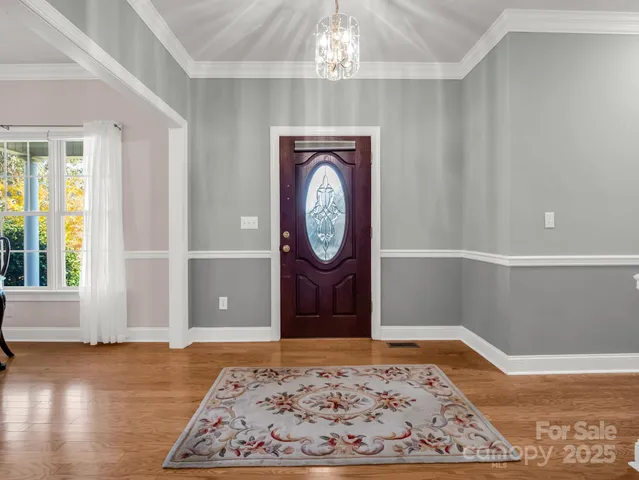a view of a hallway with entryway