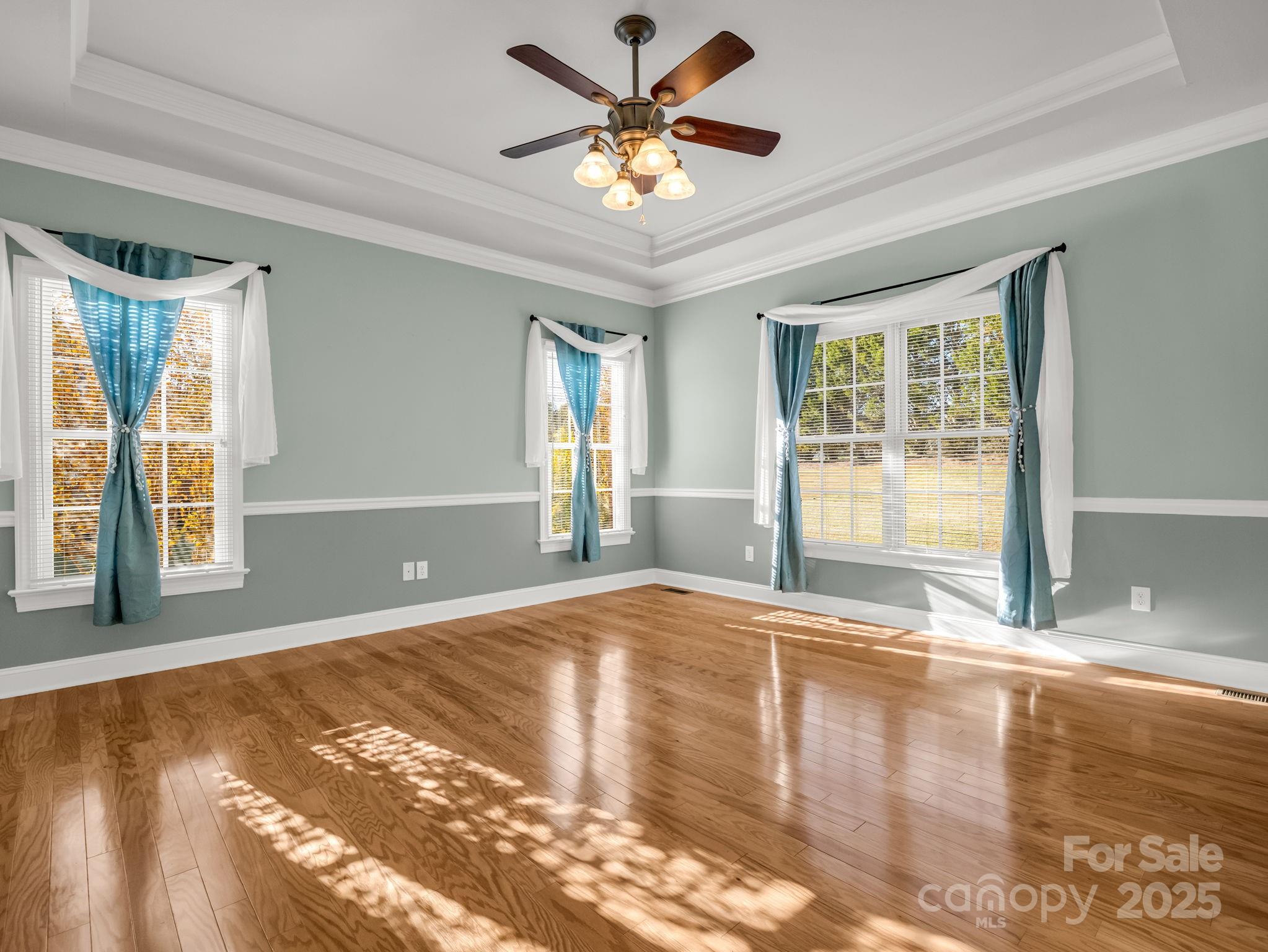 757 Smith Grove Road Forest City, NC 28043 - Photo 19 of 46 a view of an empty room with window and a kitchen