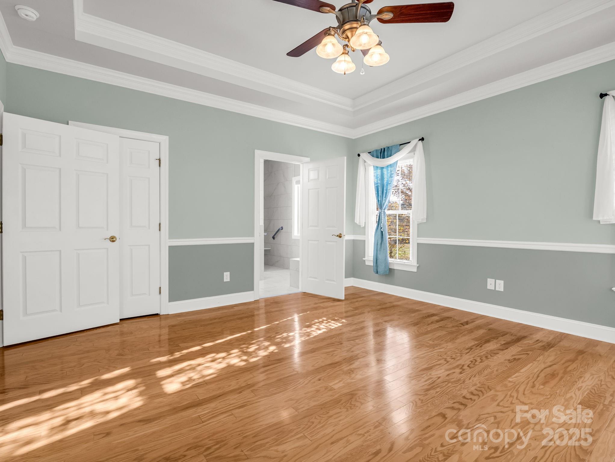 757 Smith Grove Road Forest City, NC 28043 - Photo 21 of 46 wooden floor in an empty room with a window