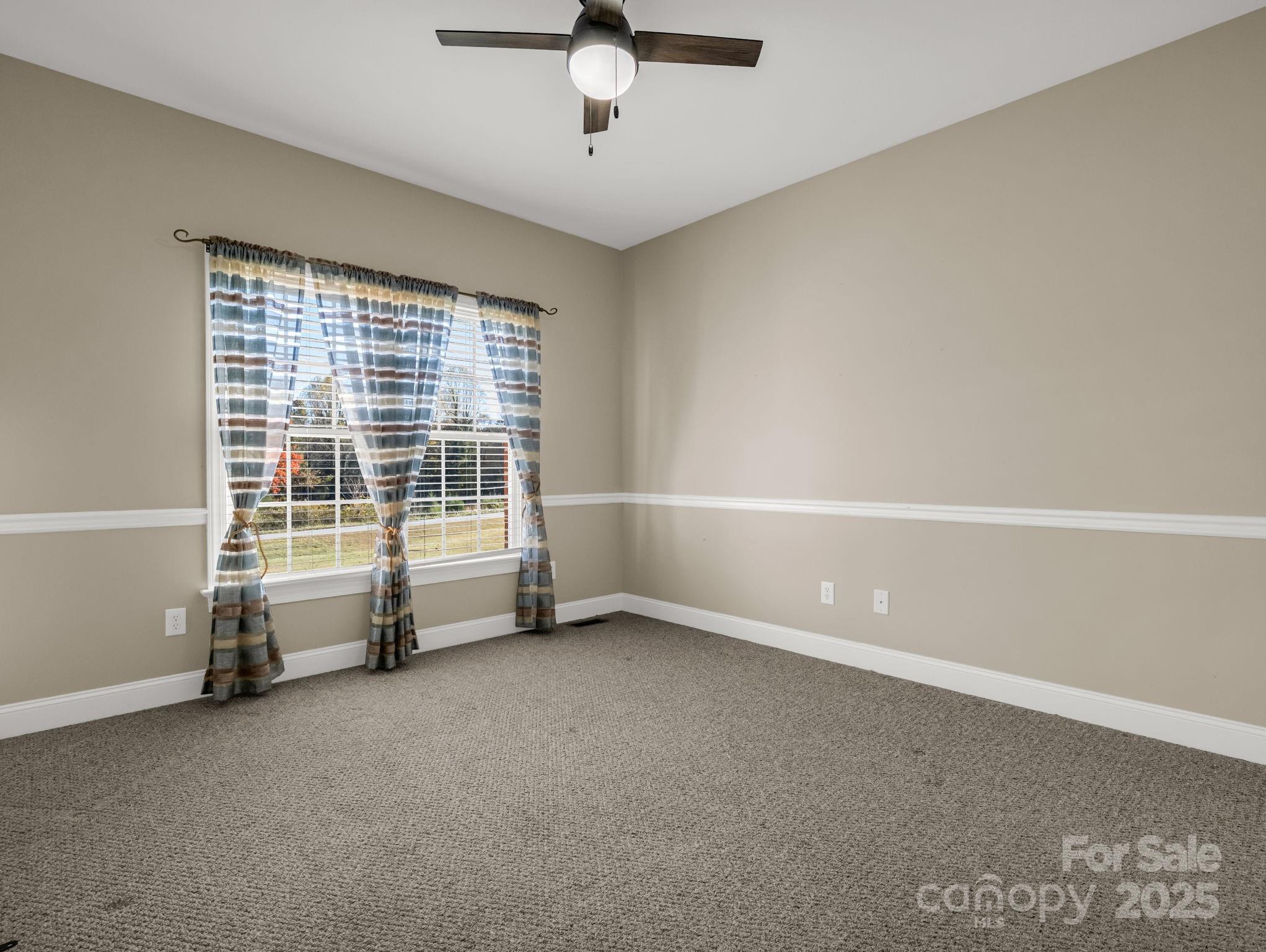 757 Smith Grove Road Forest City, NC 28043 - Photo 26 of 46 an empty room with windows