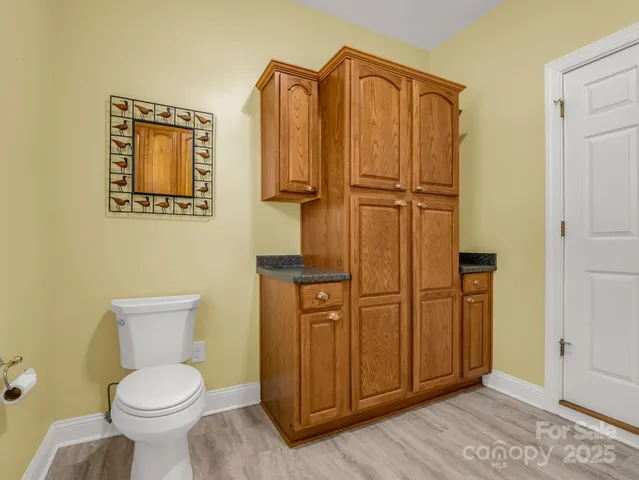 a bathroom with a toilet and a sink