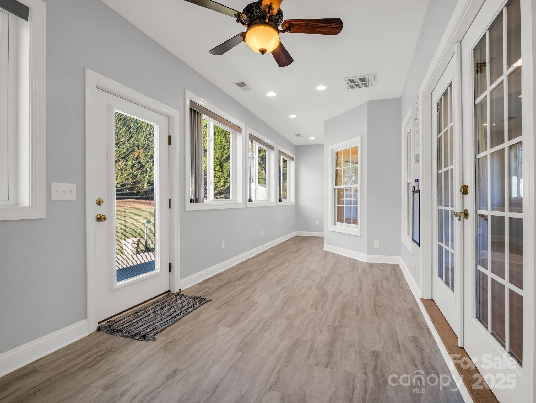 757 Smith Grove Road Forest City, NC 28043 - Photo 33 of 46 wooden floor in an empty room with a window