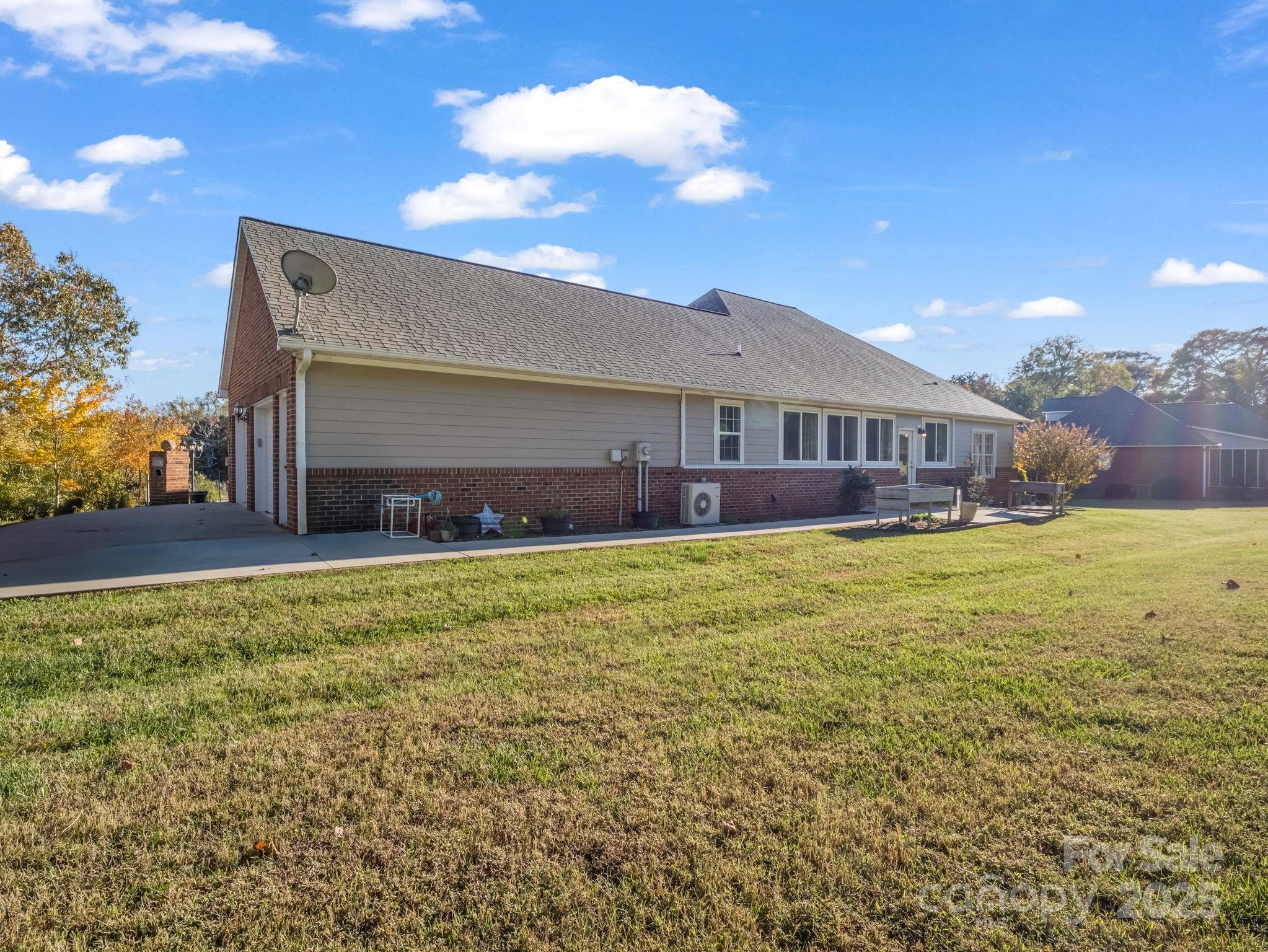 757 Smith Grove Road Forest City, NC 28043 - Photo 39 of 46 a view of an house with roof deck and a yard