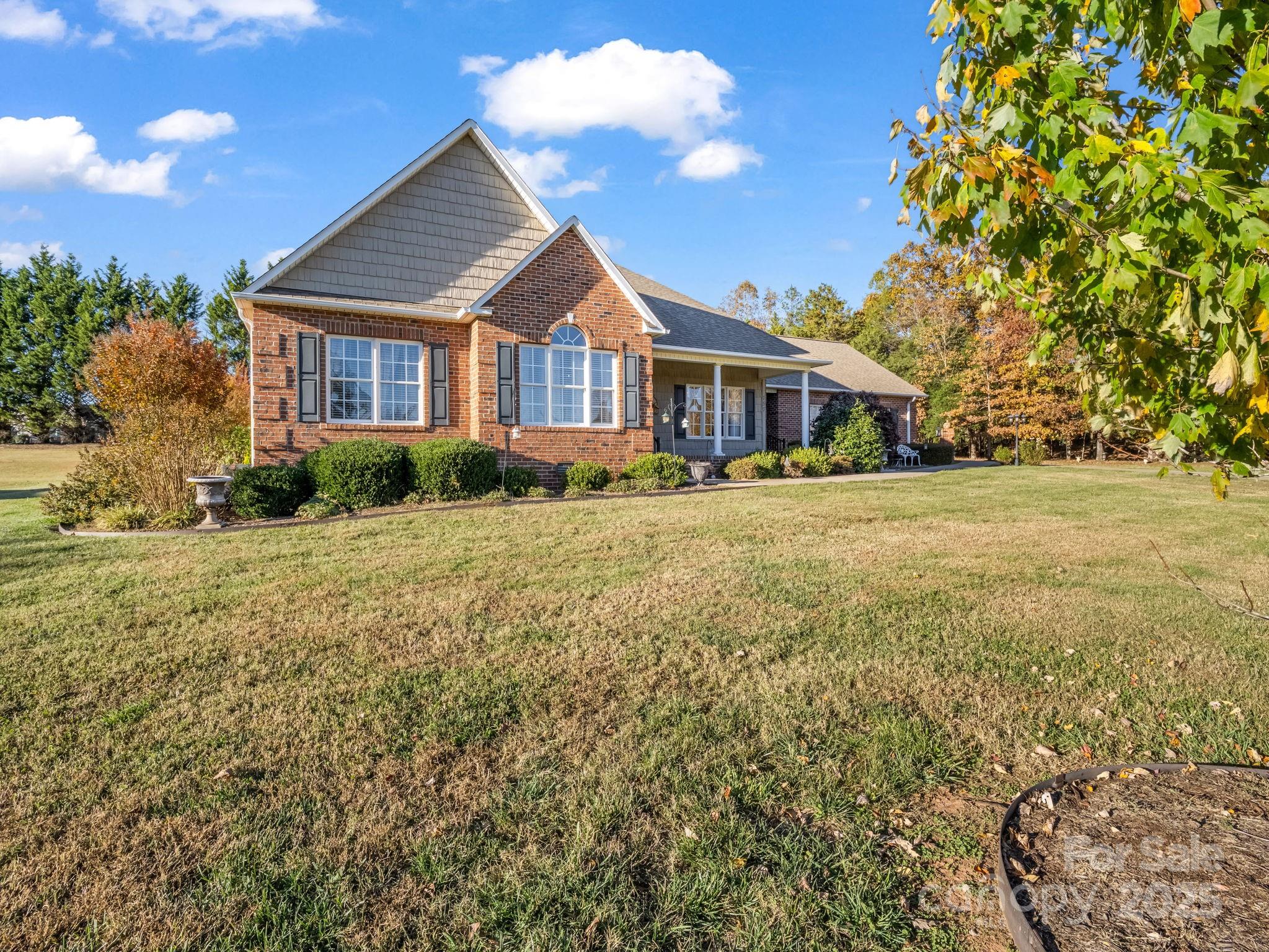 757 Smith Grove Road Forest City, NC 28043 - Photo 6 of 46 a front view of a house with a yard
