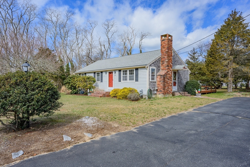 35 Wiley Lane Eastham, MA 02642 - Photo 2 of 38 a front view of a house with garden