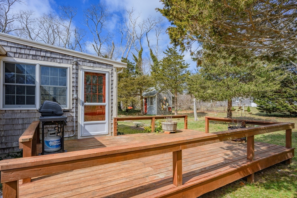 35 Wiley Lane Eastham, MA 02642 - Photo 5 of 38 swimming pool view with a outdoor seating