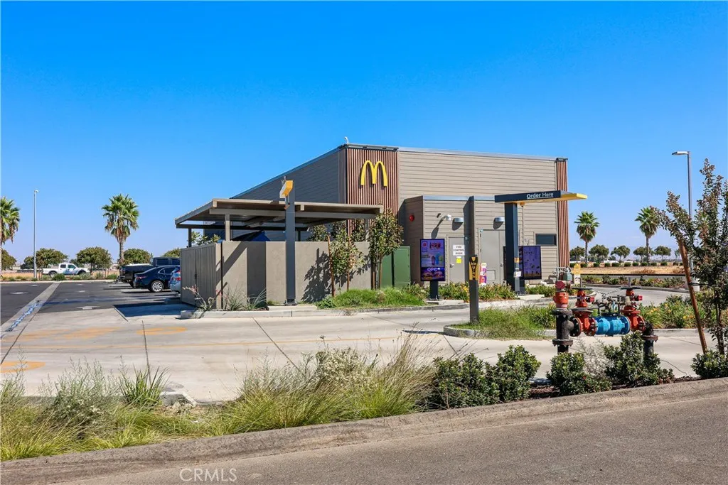 0 Henry Merced, CA 95341 - Photo 13 of 23 a front view of a house with a yard