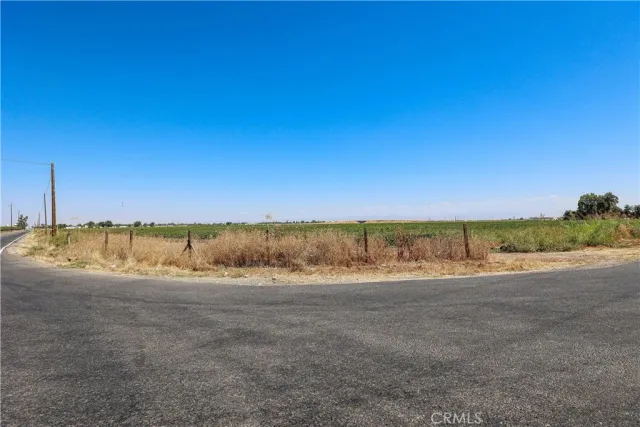 a view of a road with an ocean view