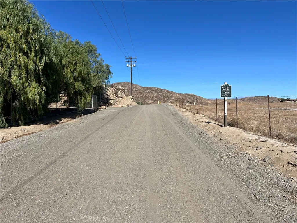 0 Ano Crest Road Winchester, CA 92596 - Photo 4 of 19 a view of a road with a building in the background
