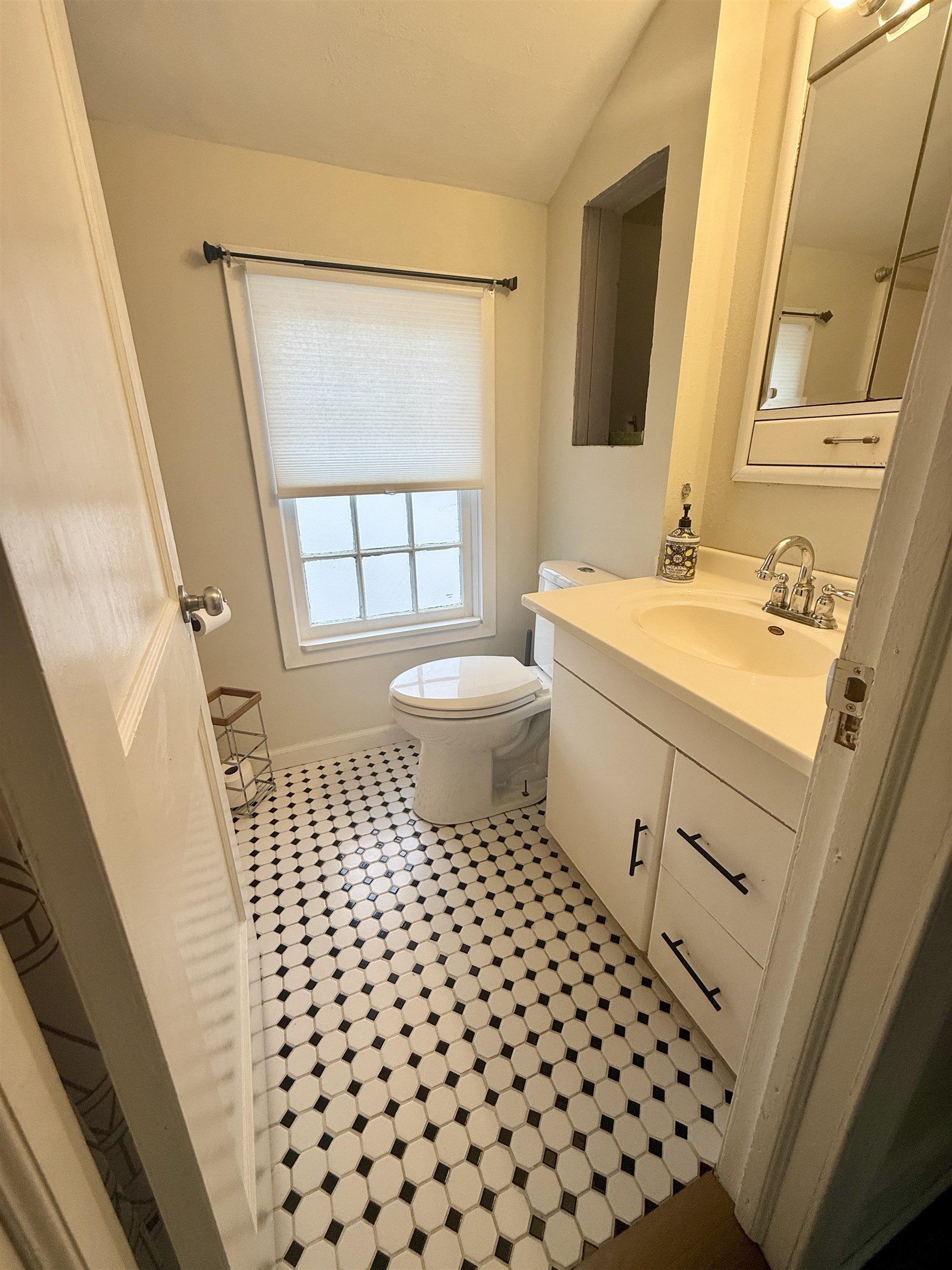 401 Junius Street Loves Park, IL 61111 - Photo 20 of 33 a bathroom with a sink a toilet and a mirror
