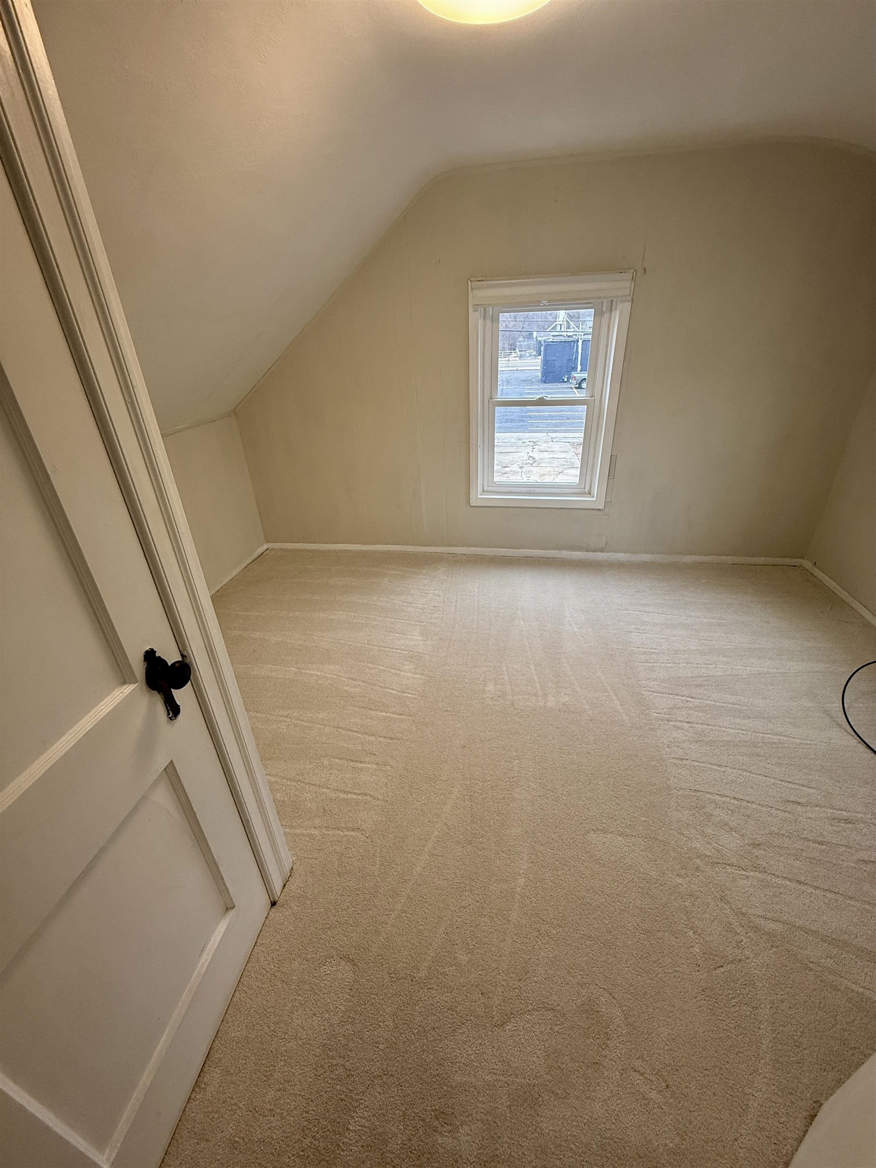 401 Junius Street Loves Park, IL 61111 - Photo 23 of 33 an empty room with windows