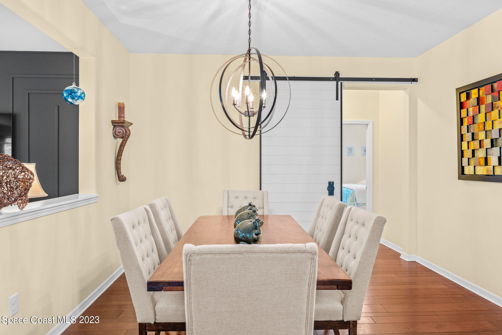 3428 Ahern Place Melbourne, FL 32940 - Photo 15 of 64 a dining room with furniture and window