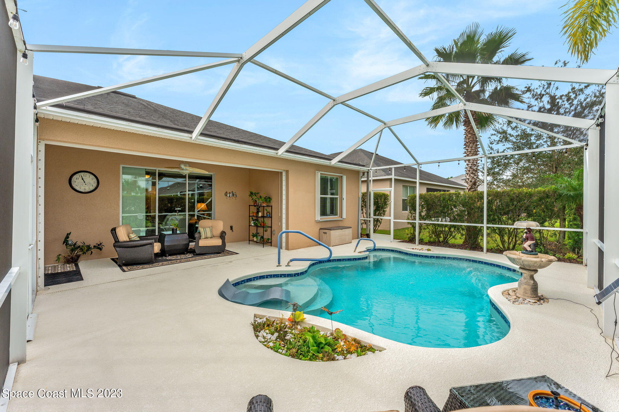 3428 Ahern Place Melbourne, FL 32940 - Photo 41 of 64 a view of a house with swimming pool