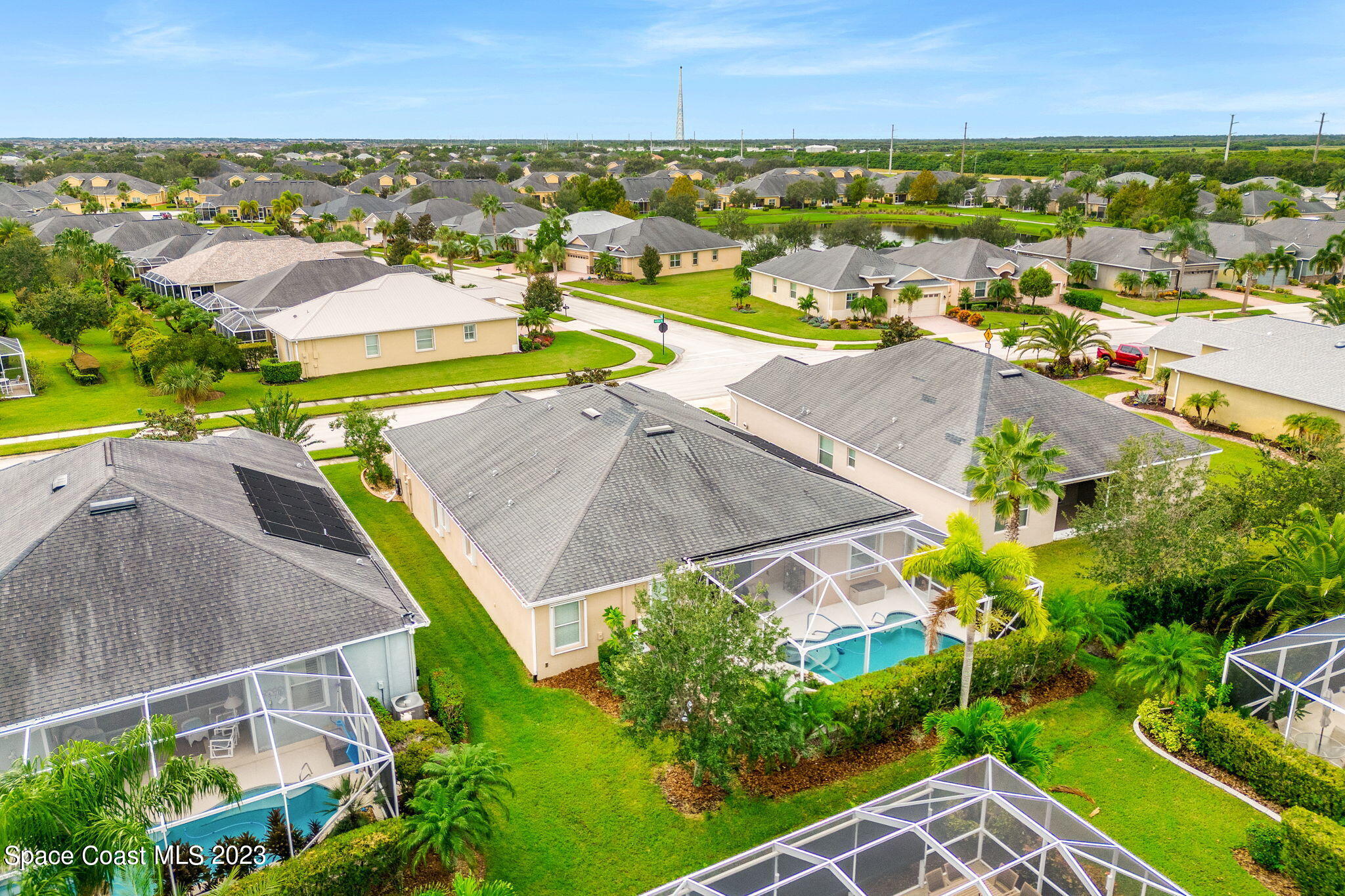3428 Ahern Place Melbourne, FL 32940 - Photo 48 of 64 an aerial view of residential houses with outdoor space