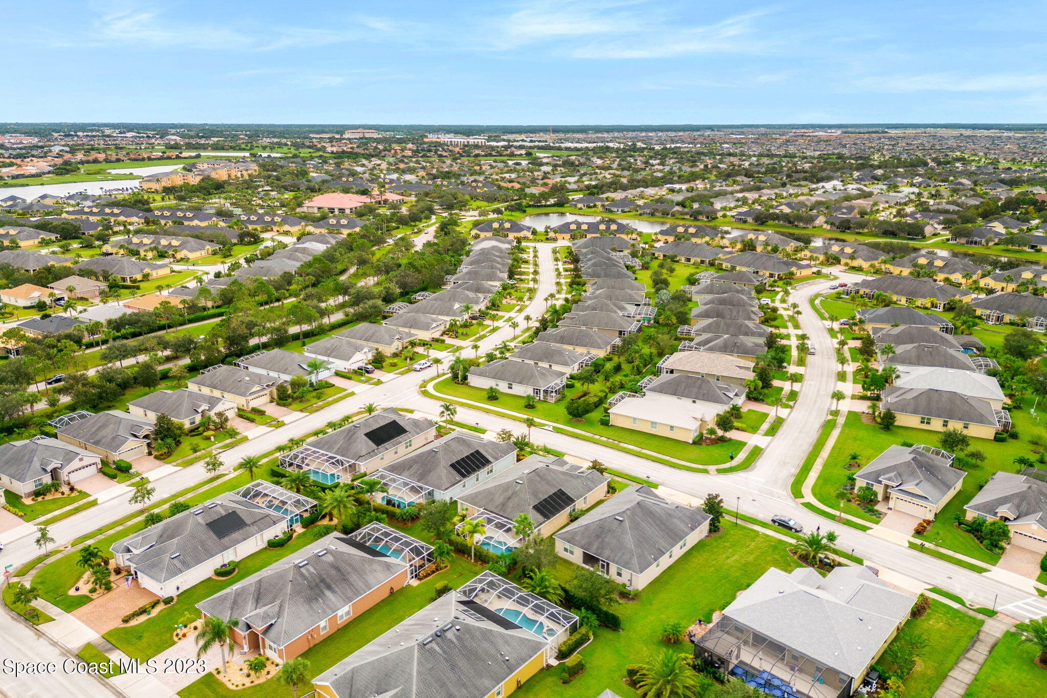 3428 Ahern Place Melbourne, FL 32940 - Photo 51 of 64 an aerial view of residential houses with outdoor space