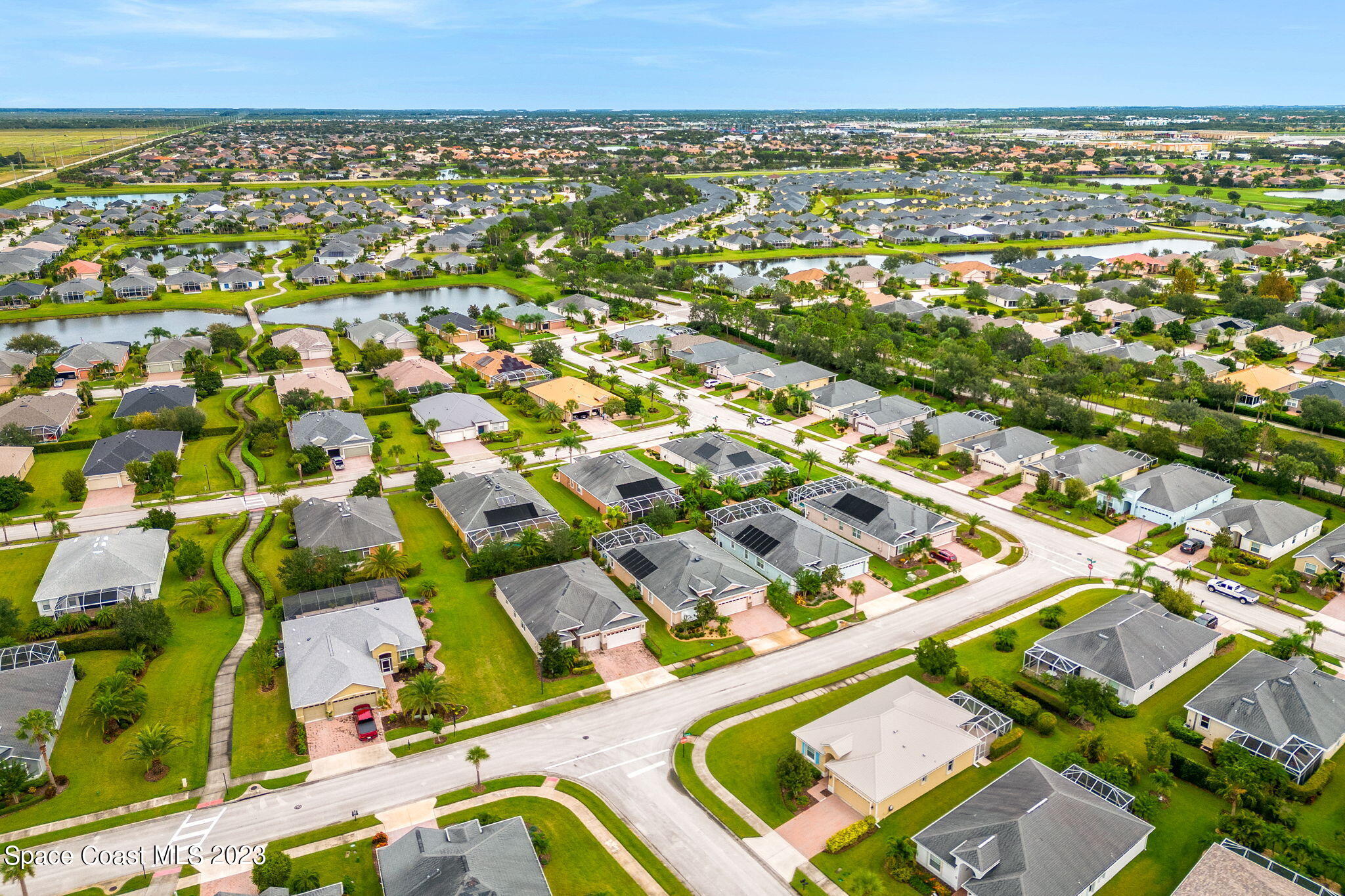 3428 Ahern Place Melbourne, FL 32940 - Photo 52 of 64 an aerial view of residential houses with outdoor space