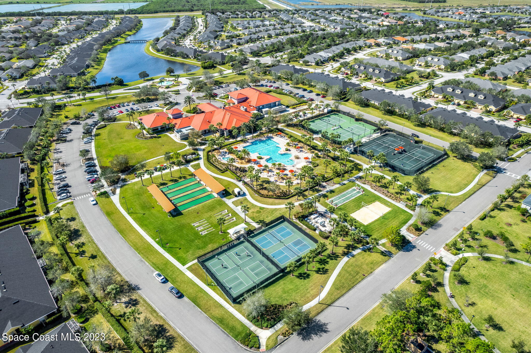 3428 Ahern Place Melbourne, FL 32940 - Photo 64 of 64 an aerial view of residential houses with outdoor space