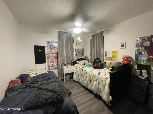 a bed room with a bed and a couch