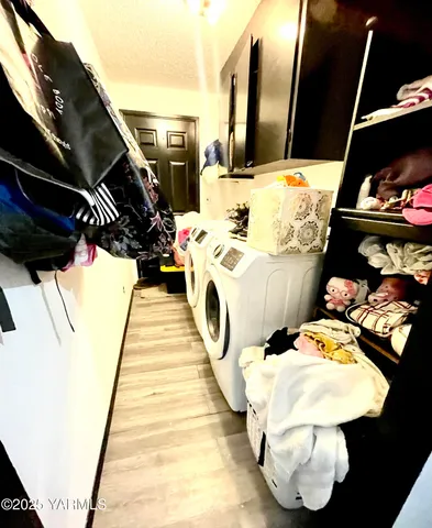 a utility room with washer and dryer