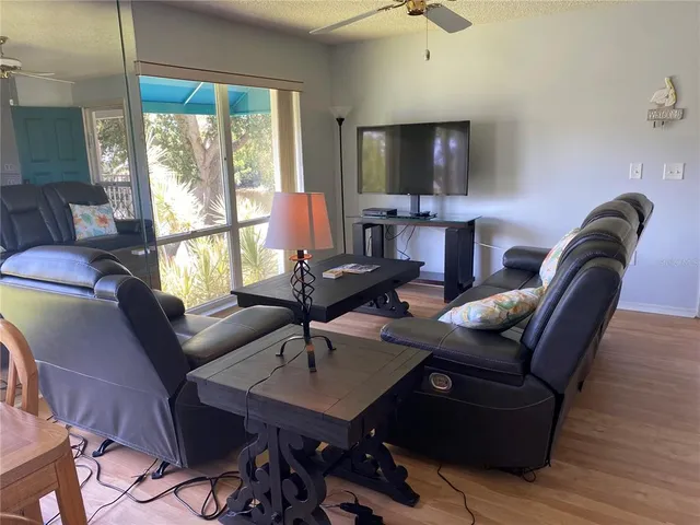 a living room with furniture and a window