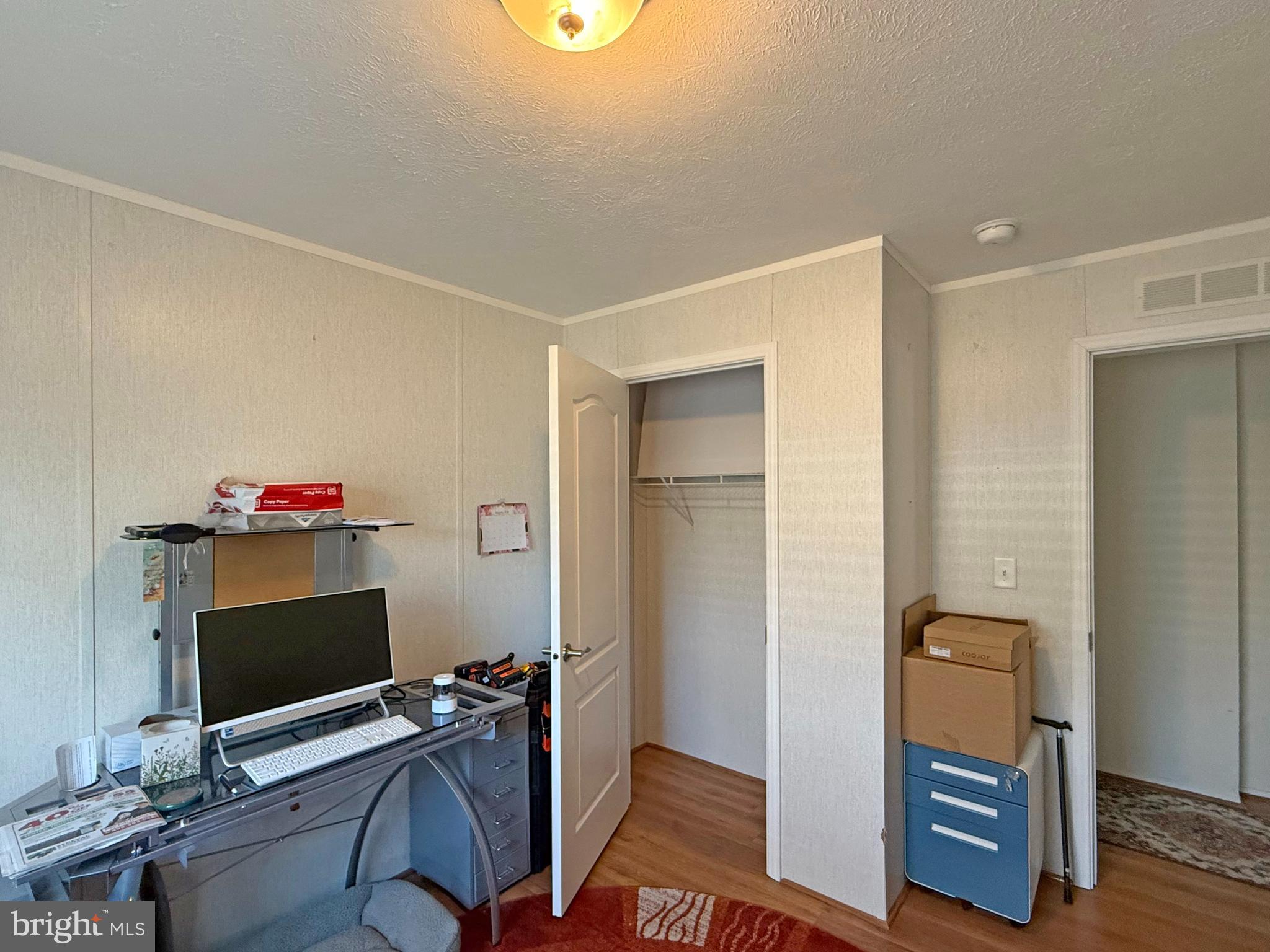 31655 Janice Road, Unit A36 Lewes, DE 19958 - Photo 17 of 32 a view of a livingroom with furniture and a flat screen tv