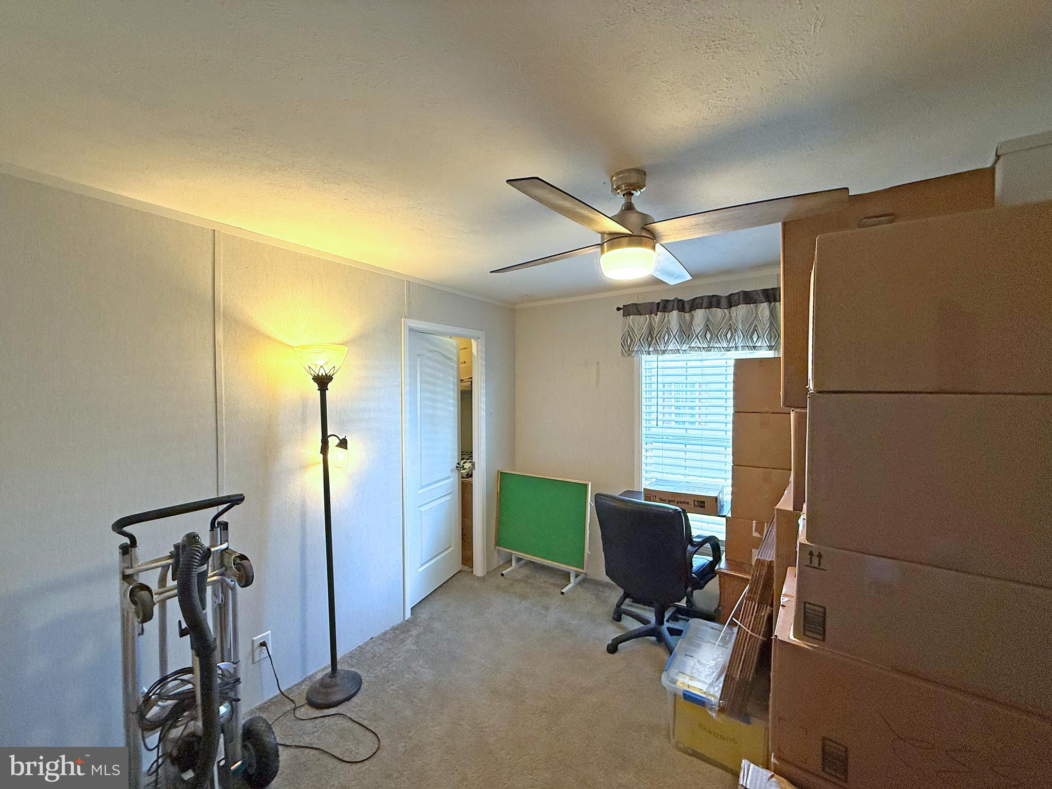 31655 Janice Road, Unit A36 Lewes, DE 19958 - Photo 18 of 32 a view of a workspace with furniture and a window