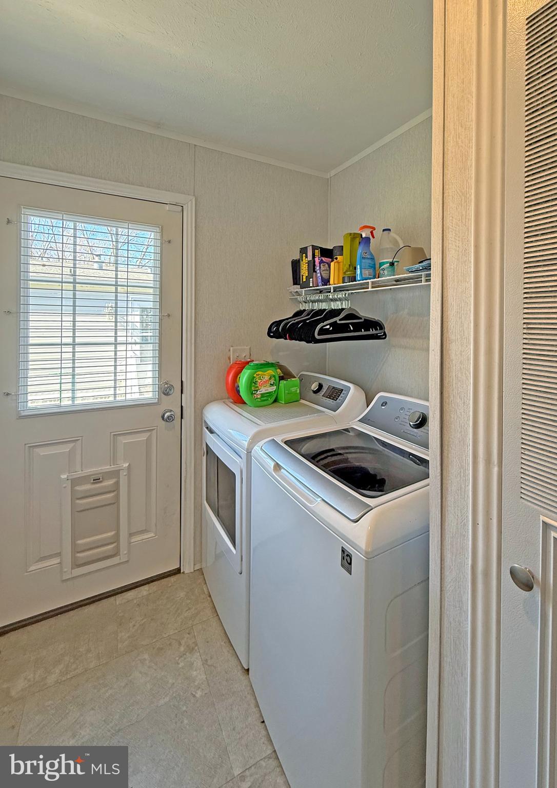 31655 Janice Road, Unit A36 Lewes, DE 19958 - Photo 20 of 32 a utility room with washer and dryer