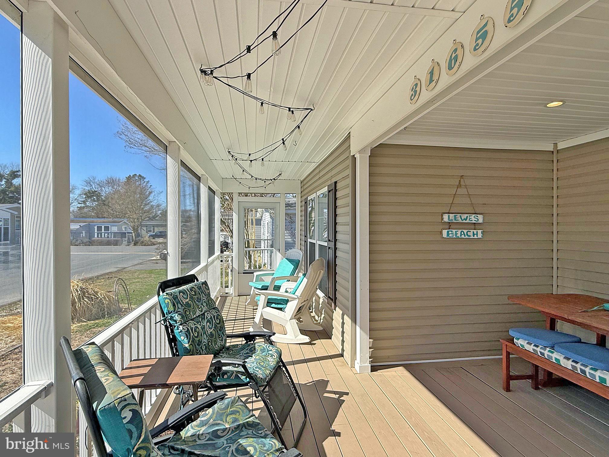 31655 Janice Road, Unit A36 Lewes, DE 19958 - Photo 2 of 32 a balcony with furniture