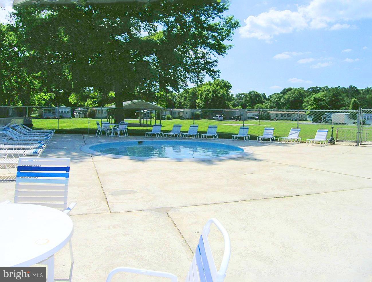 31655 Janice Road, Unit A36 Lewes, DE 19958 - Photo 32 of 32 a view of a tennis court