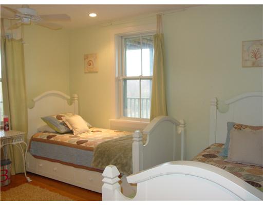 1167 Grace Cove Road Block Island, RI 02807 - Photo 8 of 11 Bedroom. First floor bedroom with twin beds.
