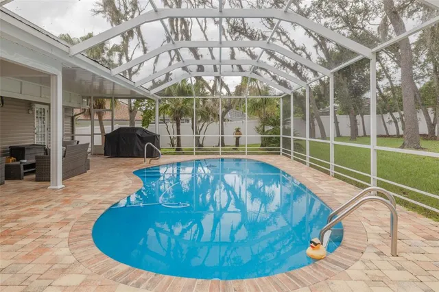 $699,900 | 3088 Enisglen Drive, Palm Harbor, FL 34683