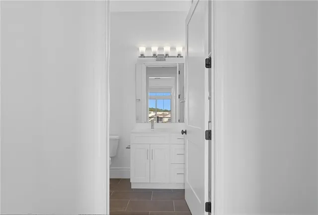 a view of backyard with large windows