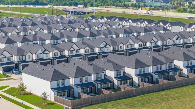 a view of a swimming pool and a yard