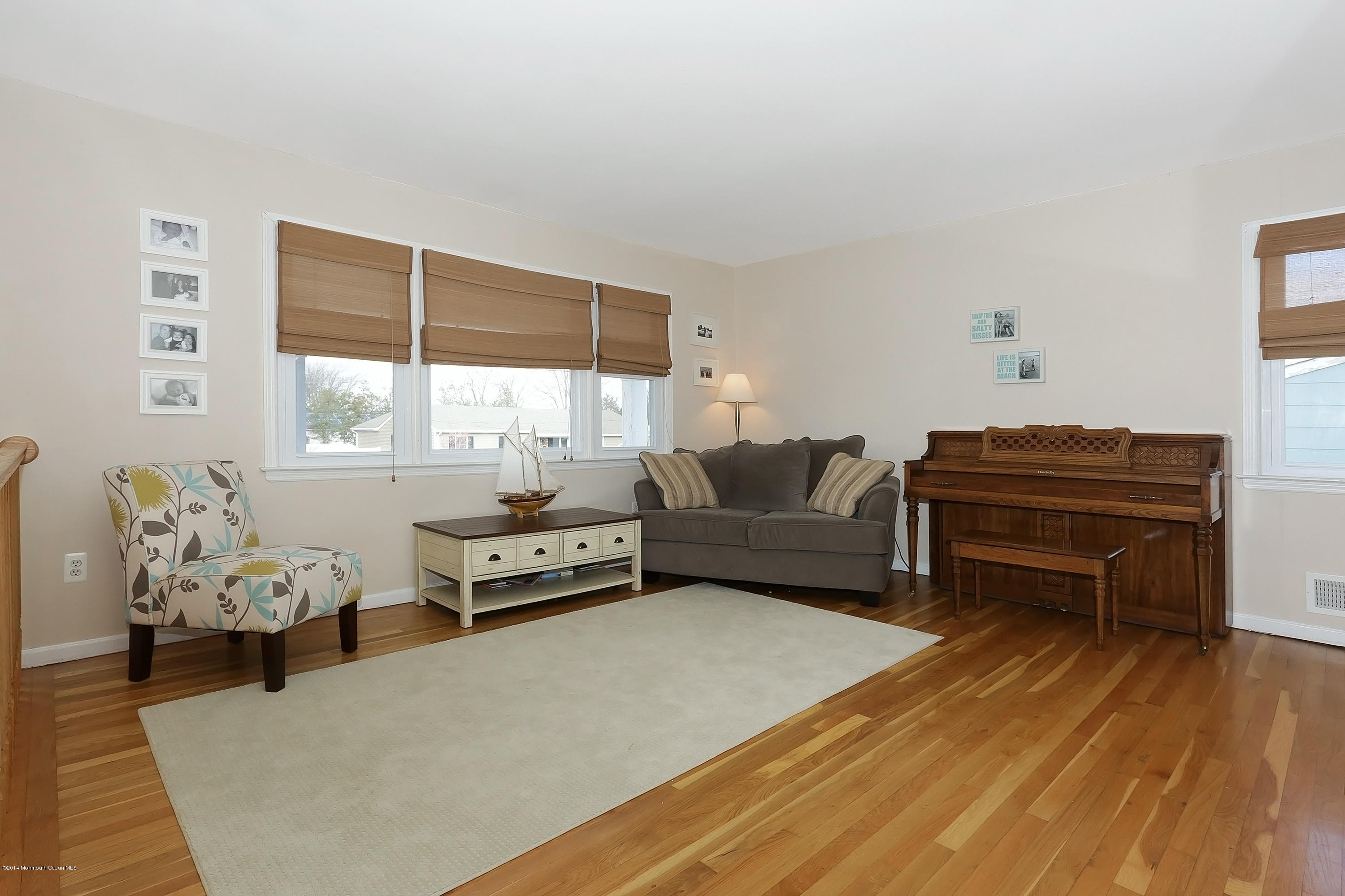 3236 Kickapoo Avenue Point Pleasant, NJ 08742 - Photo 9 of 23 a living room with furniture and wooden floor