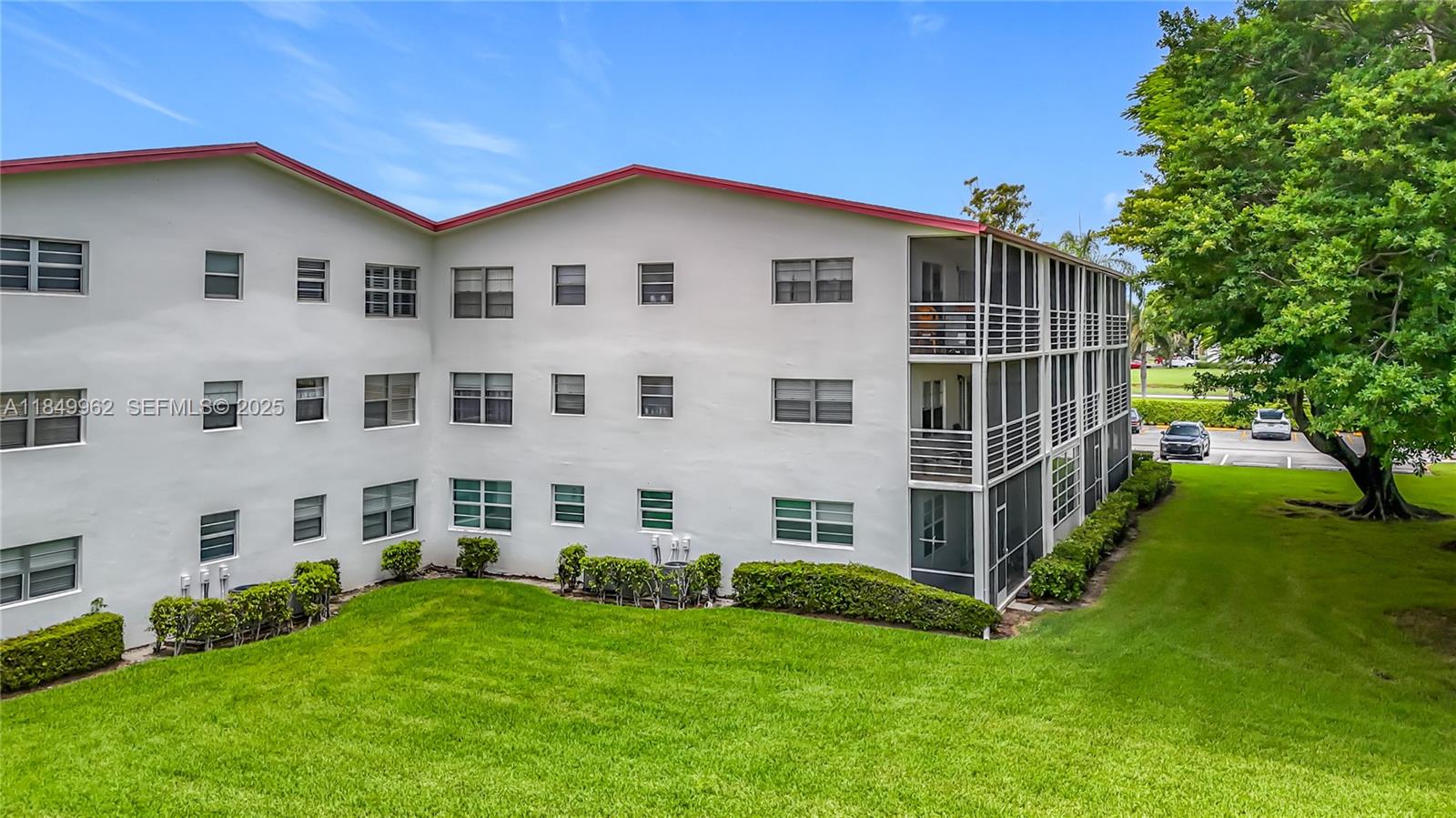618 Fanshaw O, Unit 618 Boca Raton, FL 33434 - Photo 35 of 40 a view of a house with backyard