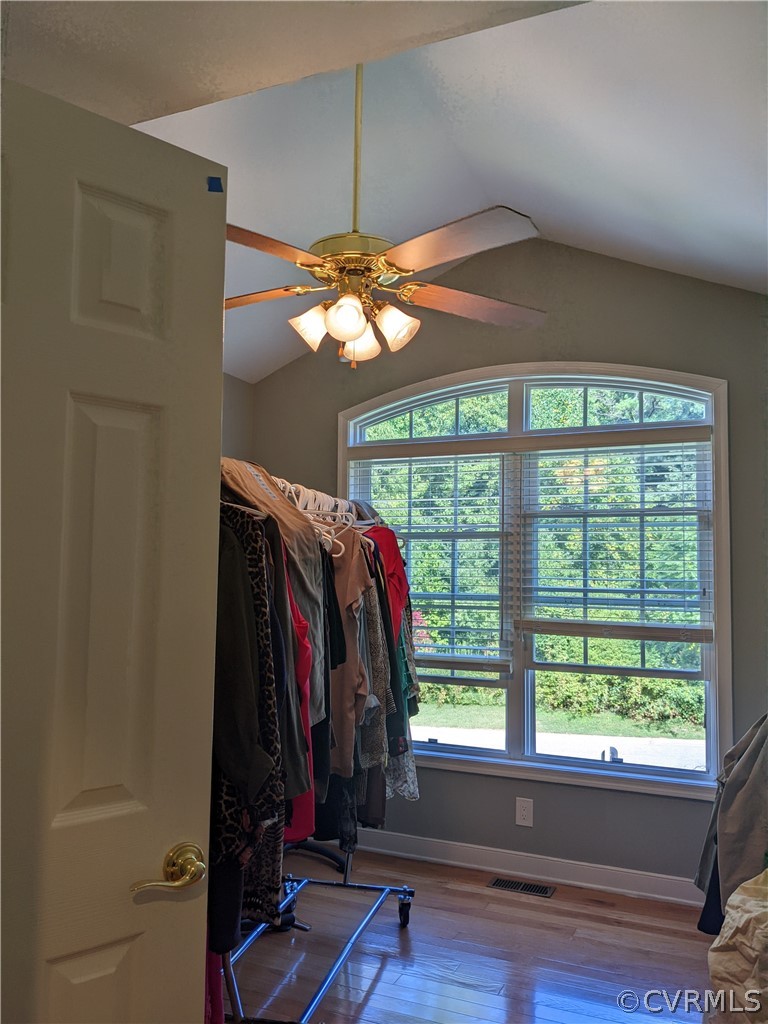11624 Hillside Road Chester, VA 23831 - Photo 12 of 20 a view of a room with furniture and clothes