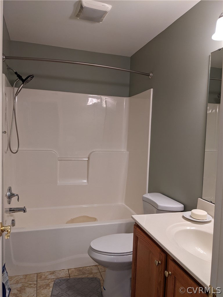 11624 Hillside Road Chester, VA 23831 - Photo 14 of 20 a bathroom with a sink a toilet and shower