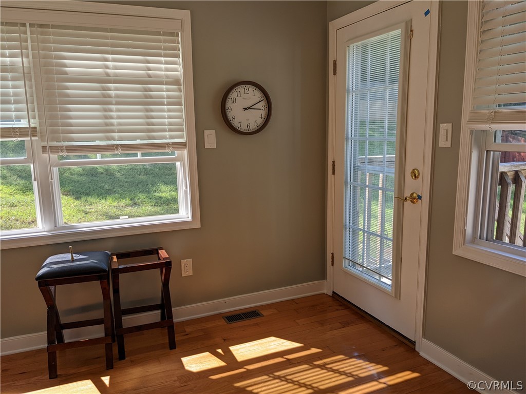11624 Hillside Road Chester, VA 23831 - Photo 5 of 20 a view of workspace with furniture and window