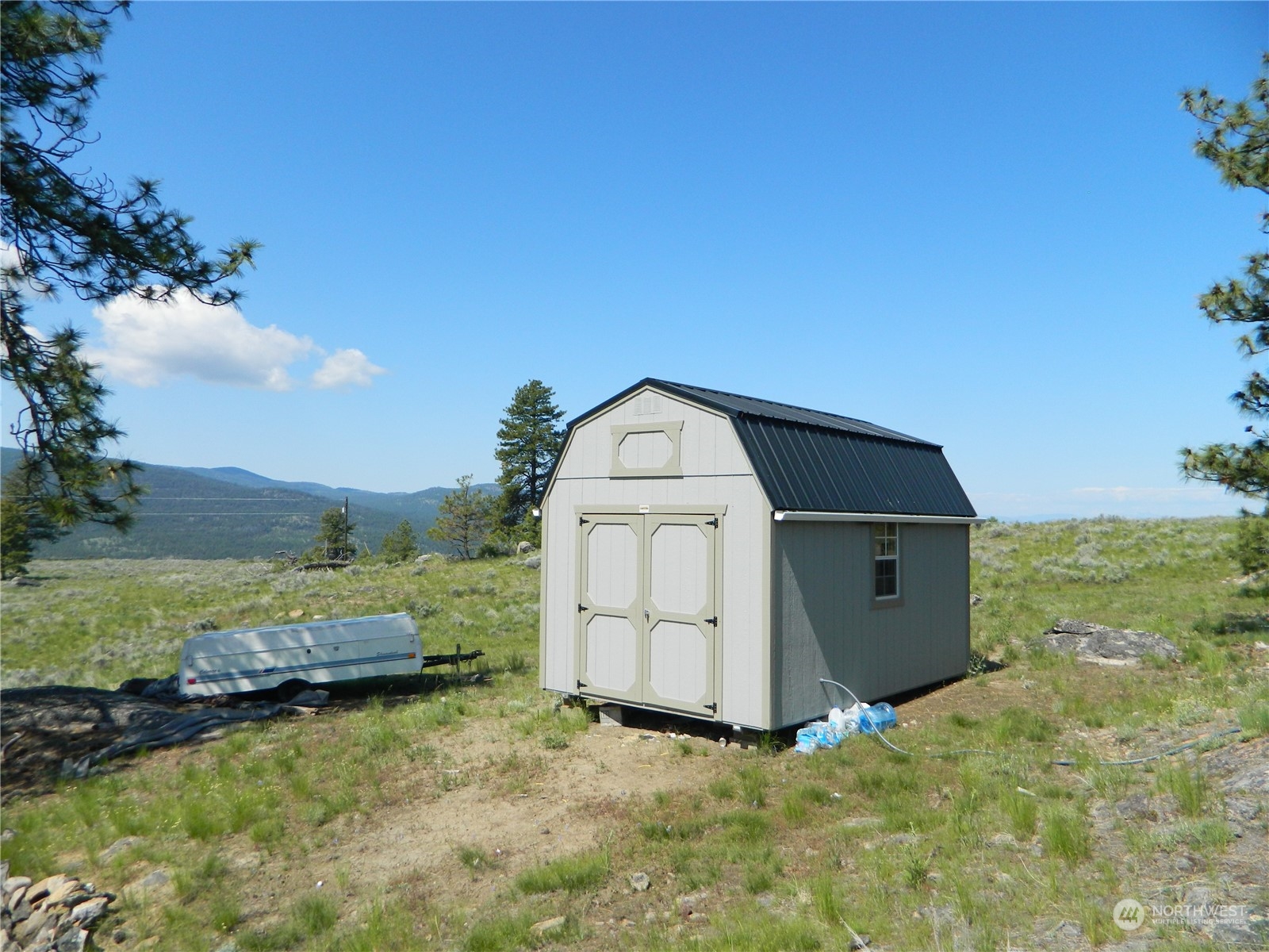 153 Neil Canyon Road Tonasket, WA 98855 - Photo 1 of 24 a view of a garden