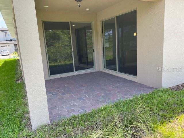 7501 Wing Span Way Harmony, FL 34773 - Photo 18 of 30 a view of a backyard of the house