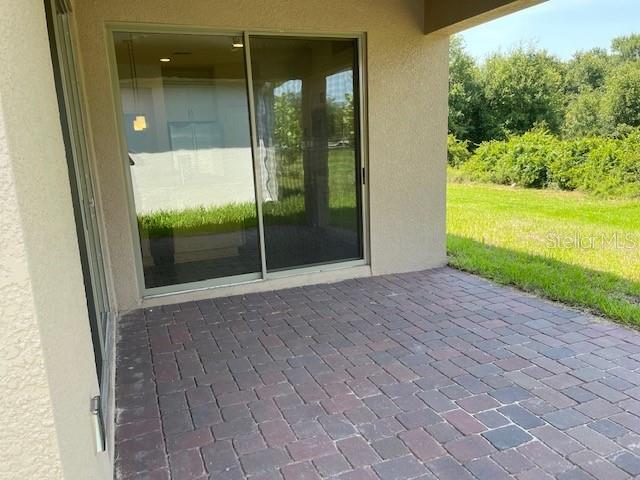 7501 Wing Span Way Harmony, FL 34773 - Photo 19 of 30 a view of a garden from a room