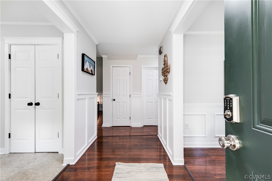 5615 Chatmoss Road Midlothian, VA 23112 - Photo 3 of 41 a view of a hallway with wooden floor and staircase