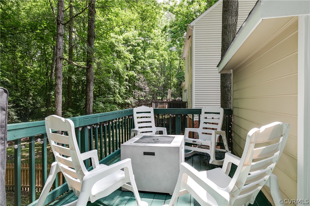 5615 Chatmoss Road Midlothian, VA 23112 - Photo 31 of 41 a view of balcony with wooden floor and outdoor seating