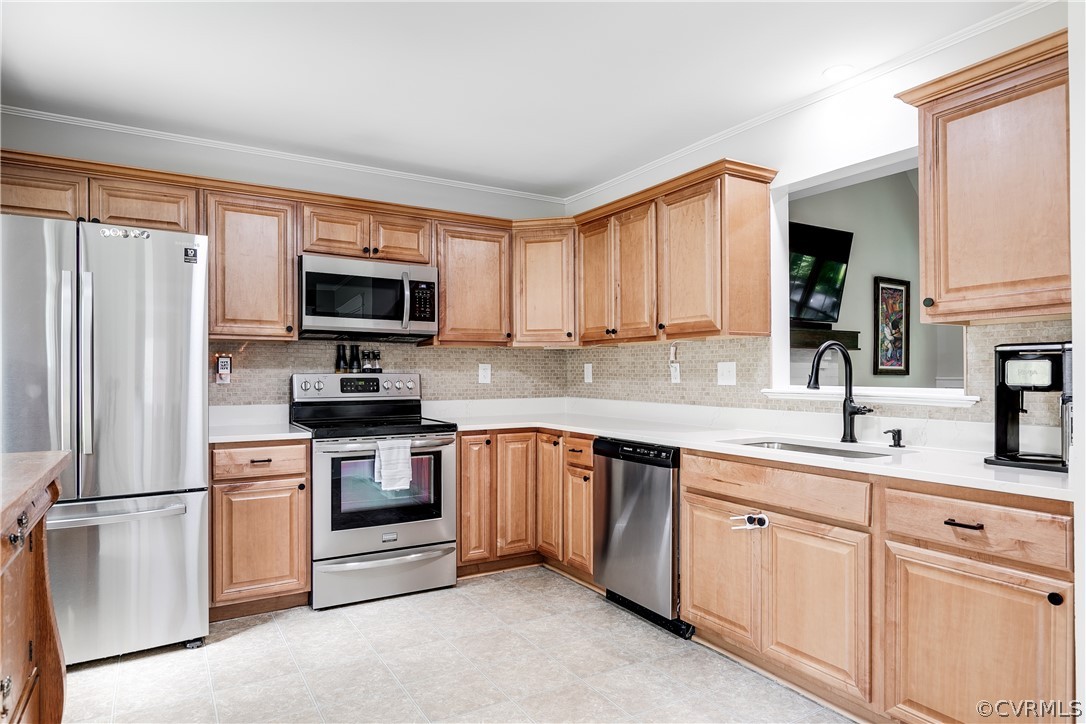 5615 Chatmoss Road Midlothian, VA 23112 - Photo 7 of 41 a kitchen with cabinets stainless steel appliances and a window