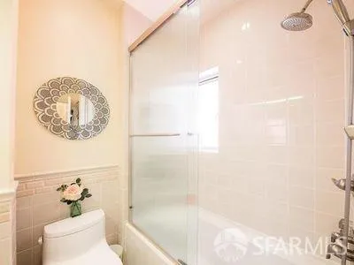 a view of a chairs and table in patio