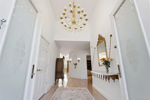 wooden floor with white walls