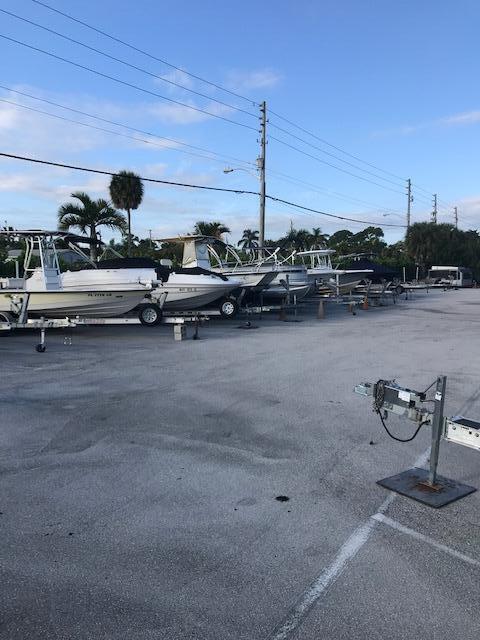 825 Center Street, Unit 1B Jupiter, FL 33458 - Photo 16 of 16 a view of a terrace with chairs